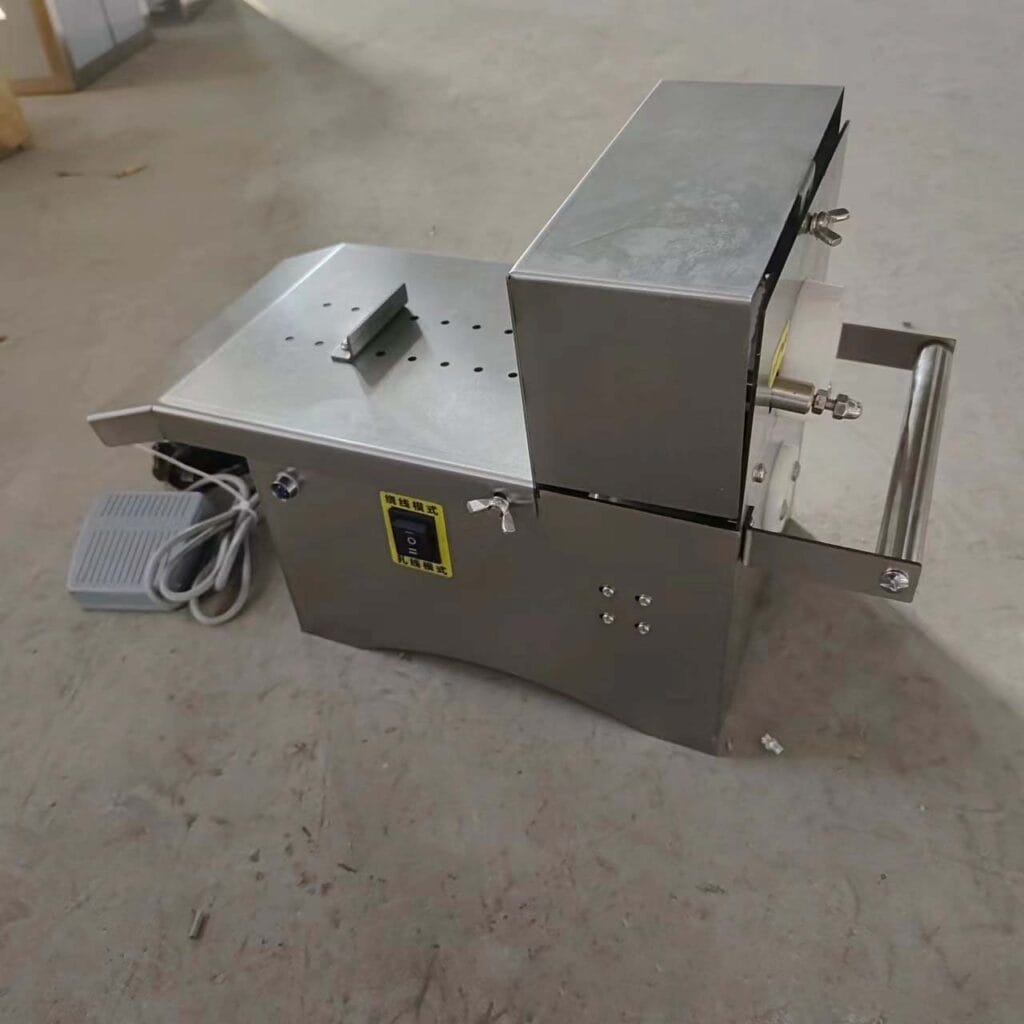 máy buộc xúc xích dùng điện