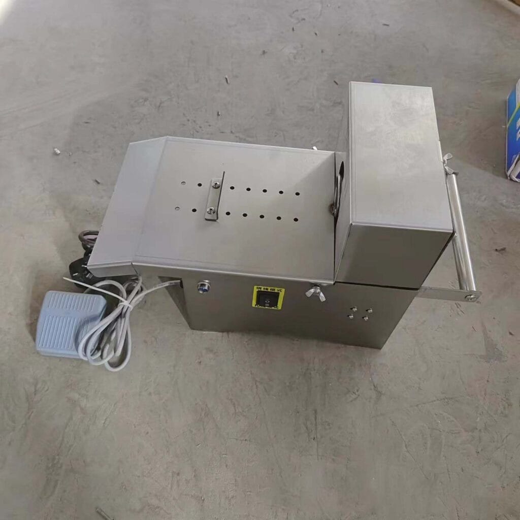 máy buộc xúc xích dùng điện